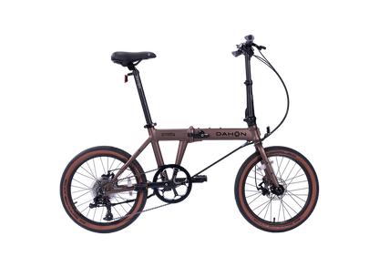 Hemingway GR Dahon folding bike in rust metallic, suitable for city and park trails.