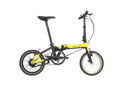 Dahon K-Feather lemon yellow folding electric bike, minimalist city commuter.