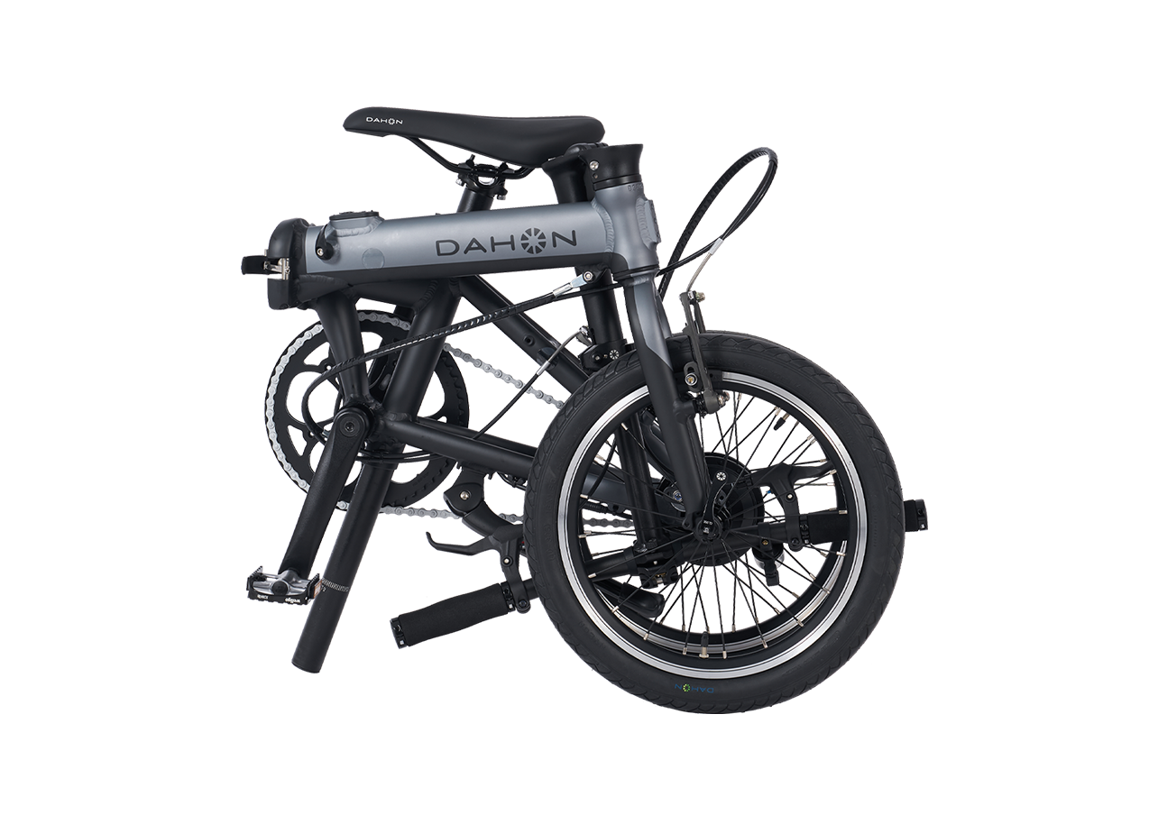 Compact silver K-Feather electric bike with minimalist design for city trips.