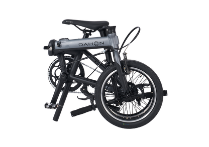 Compact silver K-Feather electric bike with minimalist design for city trips.