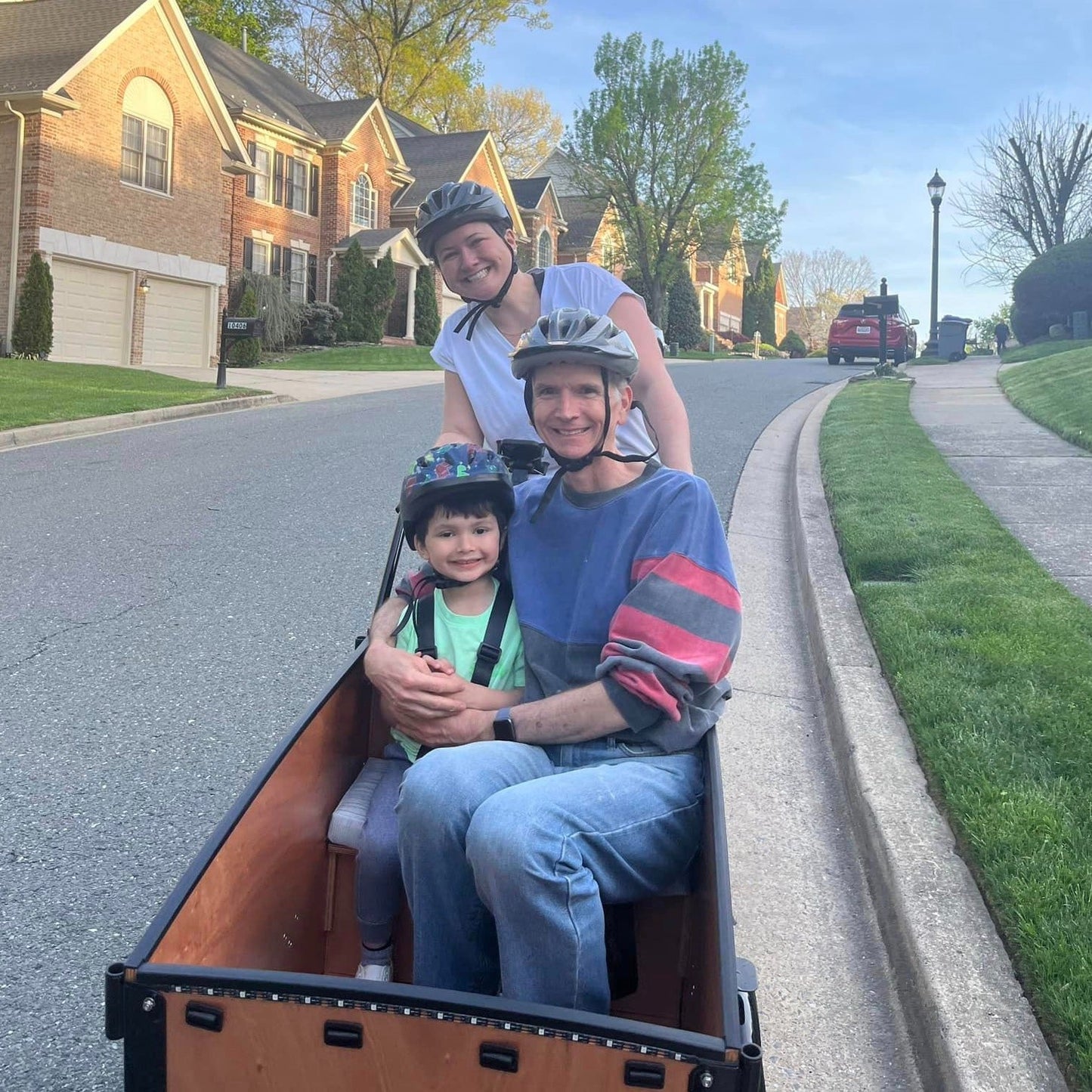 Mom with grandfather and child in Original Bunch Bike #color_Honey Woodgrain